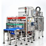 DESCRIZIONE IMMAGINI PER SITO La Inox-CMP progetta e realizza caricatori su misura, completamente lavabili in C.I.P. senza la necessità di smontare carter e coperchi. La soluzione integra vasca di raccolta di dimensioni ridotte secondo esigenze del cliente, tramoggia, nastro elevatore inclinato con tappeto modulare blu, pompa per acqua e detergente, valvole e tubazioni in acciaio inox AISI 304/316. Vantaggi: massima flessibilità sui formati, alta capacità produttiva, lavaggio e sanificazione automatici e completa ispezionabilità del nastro. (NASTRO ELEVATORE CON VASCA DI DIMENSIONI RIDOTTE) IMMAGINE (1) (NASTRO ELEVATORE CON VASCA ED INCLINAZIONE STANDARD) IMMAGINE (2) Caricatore automatico per 2 macchine e 2 prodotti alternativi, progettato per superare i limiti dei sistemi commerciali. Grazie a 2 nastri canalizzati, vasca con divisorio, cassetti di rifasatura e pompa integrata, offre: Versatilità estrema: lavora formati diversi in parallelo. Lavaggio C.I.P. automatico: sanificazione totale senza smontare carter o coperchi. Ispezione totale lungo l'intera lunghezza dei nastri e alta produttività. Efficienza e igiene senza compromessi. ( CARICATORE DOPPIO) IMMAGINE (3) Il Ribaltatore Universale INOX-CMP è progettato per garantire efficienza, versatilità e sicurezza nella movimentazione e nello svuotamento di contenitori in diversi settori industriali, tra cui agroalimentare, caseario, farmaceutico e logistica. Il sistema è compatibile con contenitori di diverse dimensioni e altezze, installati su pallet DIN ed EURO, quali Octobin, gabbie metalliche, casse rettangolari multiformato e cestoni in plastica (Bins). (RIBALTABIN) IMMAGINE (4) L’impianto realizzato da INOX CMP SRL è costituito da una linea automatizzata per il trattamento dei lupini secchi, comprendente le fasi di reidratazione, cottura e de-amarizzazione. A valle del processo è integrato un sistema automatico per l’infustaggio del prodotto. L’intero impianto, incluse le apparecchiature e le strutture a contatto con il prodotto, è realizzato in acciaio inox, garantendo elevati standard di igiene, resistenza alla corrosione e facilità di sanificazione. (IMPIANTO REIDRATAZIONE E COTTURA LUPINI (LUPINUS ALBUS) IMMAGINE (5) Sistema automatico customizzato per il confezionamento di burrata in vasetti, progettato per integrare una formatrice di burrate con una macchina confezionatrice esistente. L’impianto è costituito da un insieme coordinato di nastri trasportatori e dispositivi di movimentazione, studiati per gestire due diversi formati di vasetto. Il sistema provvede all’alimentazione e al corretto posizionamento dei contenitori sotto la formatrice, al successivo trasporto verso la confezionatrice e al deposito automatico dei vasetti all’interno della macchina. Una soluzione completamente su misura, sviluppata per garantire continuità, precisione e affidabilità del processo produttivo. (CONFEZIONAMENTO BURRATA IN VASETTI) IMMAGINE (6)